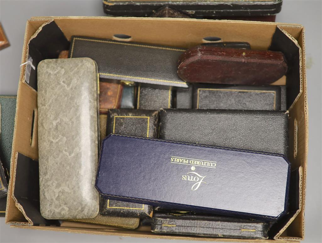 Twenty assorted jewellery and cutlery boxes including a gilt tooled leather box by Mappin & Webb.